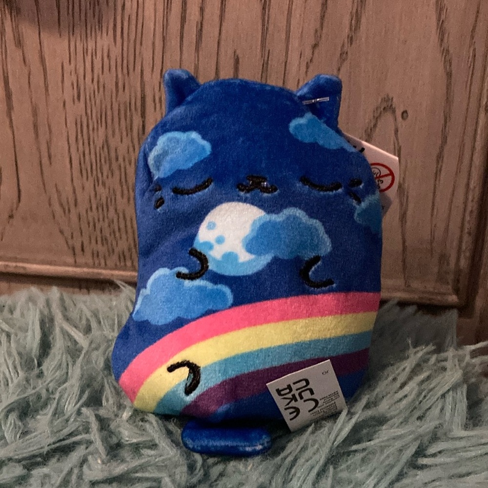 Cats vs pickles Blue Cat Plush with Rainbow Design